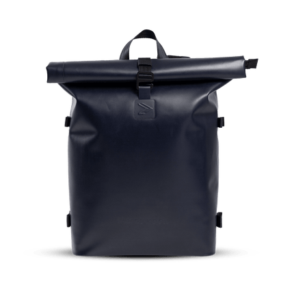 A deep navy backpack with black straps. The backpack has a sleek and modern design, perfect for carrying all your essentials on the go.