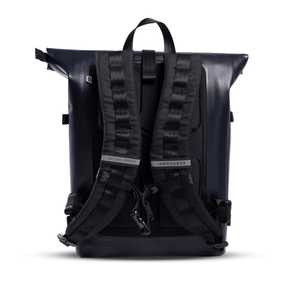 A deep navy backpack with black straps. The backpack has a sleek and modern design, perfect for carrying all your essentials on the go.